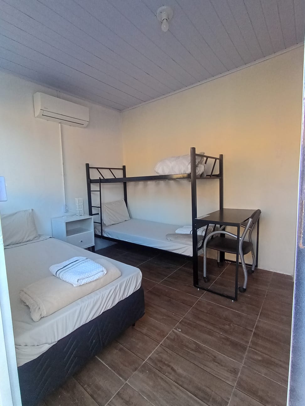 Suíte Família do New Hotel com beliche e camas extras
